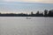 Man rowing on a boat on a lake at dusk