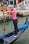 Man rowing gondola in Venice, Italy
