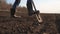Man in rubber boots shovels black dirt soil. Eco smart agriculture land farming concept. lifestyle worker agronomist a
