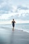 Man Running On Beach, Jogging During Outdoor Workout. Sports Con