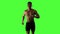 Man running on green screen background, slow motion, drop shadow