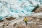 Man running at Nigardsbreen glacier Traveling