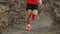 Man running outdoor sprinting for success - male fitness runner on lava trail