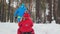 Man runs drawing sled with children in park