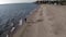 Man runs on the seashore aerial view