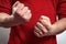 The man`s clenched fists. aggression, domestic or family violence