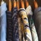 Man`s closet hangers shirts closeup