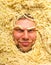 Man\'s face in pasta, closeup