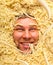 Man\'s face in pasta, closeup