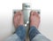 Man`s feet on weight scale - Diabetes