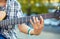 Man\'s hand with a acoustic bass guitar