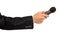 Man\'s hand in black suit holding a microphone