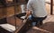 Man s hand with boat tiying rope. Sailor seaman gondolier Yachtsman moors his motor boat at jetty. Close up hands and bow of the b