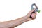 Man`s hand with hand expander hand gripper. Hand grip strengthening tool. Expander with spring.