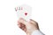 A man`s hand hold four aces on white background, image for gambling, luck, win or entertainment purpose