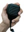 Man\'s hand holding Handheld microphone for walkie-talkie