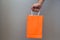 Man`s hand holding shoping bag