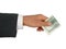 Man\'s hand offering money.