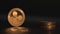 Man's hand put crypto coins one on top of the another. Golden ripple coin XRP with reflection on the foreground with