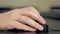 Man\'s hand using computer mouse