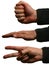 Man\'s hands doing rock, paper, scissors