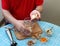 Man\'s hands preparing banana for sweet smoothie