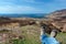 Man\'s legs relaxing after hiking on scottish islands