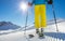 Man`s legs in ski boots, standing on alpine skis