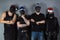 Man\'s metal band in christmas hats