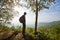 Man\'s silhouette at a viewpoint overlooking central Thailand