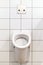 Man`s toilet. Urinal. White clean urinals in public restroom. Public man toilet