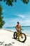 Man With Sand Bike On Beach Enjoying Summer Travel Vacation