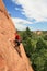 Man sandstone rock climbing