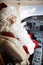 Man In Santa Costume Sitting In Private Jet\'s