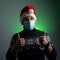A man in a Santa hat and a medical mask gives a thumbs up