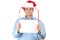 Man in santa\'s hat holding empty blank card