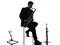 Man saxophonist playing saxophone player silhouette