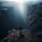 Man is seen walking across a suspension rope bridge over the abyss that spans across vast mountainous terrain,