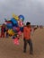 Man selling colourful original balloons, Chennai beach, southern India