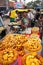 Man selling cookies at Kinari Bazaar in Agra, Uttar Pradesh, Ind