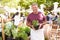 Man Selling Herbs And Plants At Farmers Food Market