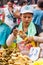 Man selling pomegranate juice