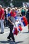 Man selling Serbian flags during sunny summer day