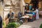 Man selling typical arabian aromatic herbs in a street of Morocco.