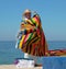 Man sells blankets on Beach Puerto Vallarta Mexico