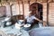 Man sells curd in the front of a Haveli in Bikaner