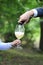 Man serves champagne to his woman