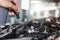 Man service mechanic maintenance inspection service maintenance car Check engine oil level car in garage showroom dealership