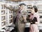 Man serving a dish to a woman in a Automat