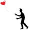 A Man In Shadow Let the Red Balloon Shaped Heart Fly Away